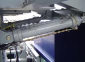 Hydraulic cylinder shown in position to raise the main ramp.
