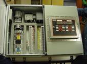 This control enclosure is a universal package that can operate a wide variety of equipment. It contains an Allen Bradley PLC with digital and analog capability and a Hagglunds Spider Controls for controlling open loop or closed loop pumps. This application was for a hard rock drilling rig in Utah. It provides complete draw works and top drive control including weight on bit and top drive torque.