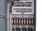 This is a motor starter panel for a three (3) x 75 HP hydraulic unit. The starter panel is a relay logic base and has time delay between electric motor stating to minimize the electric load input.